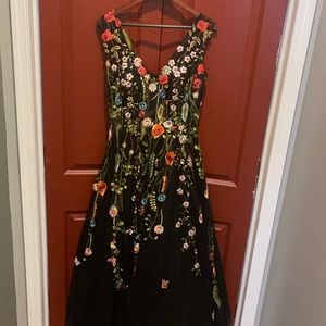 Stand out in the crowd with this Dave & Jonny gown